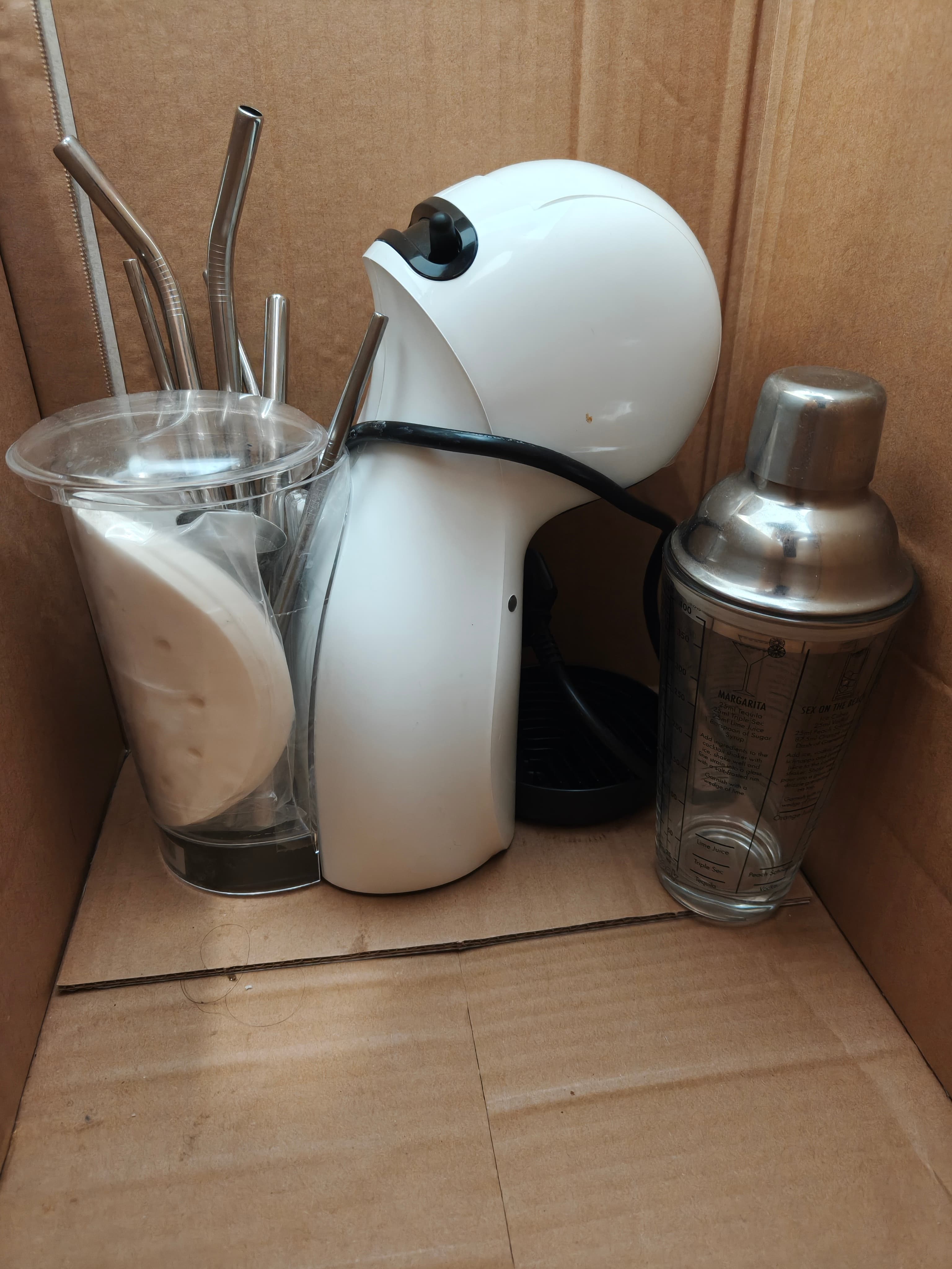 Nescafe Dolce Gusto coffee machine with shaker