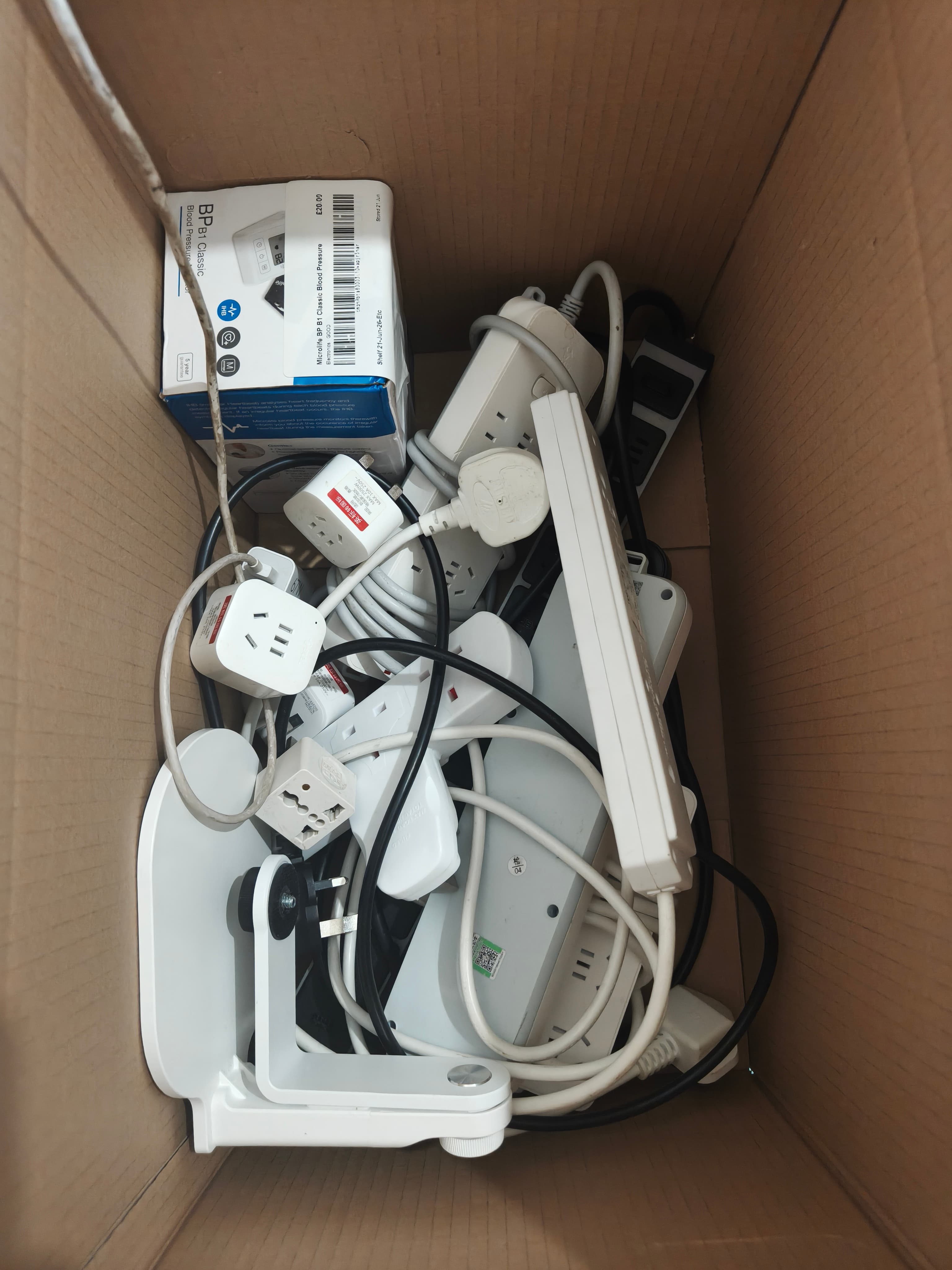 Box of assorted electrical cables and adapters